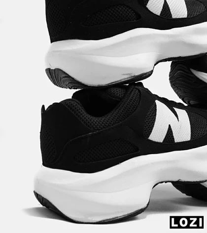 کفش کتانی مردانه مشکی سفید NEW BALANCE 547