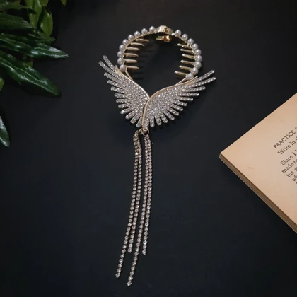 گیره مو زنانه مدل آبشاری گوجه ای طرح بال فرشته آویز دار