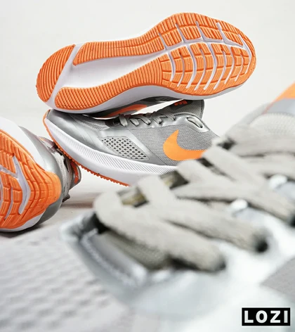 کفش کتانی مردانه طوسی نارنجی Nike guide 10