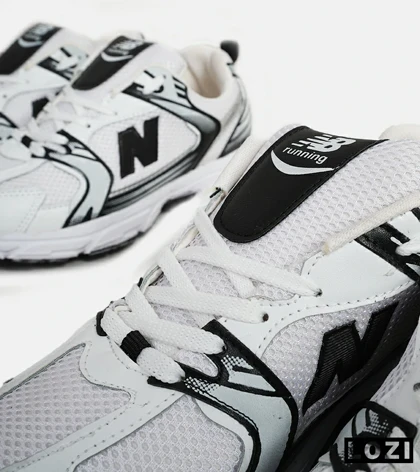 کفش کتانی مردانه و زنانه سفید طوسی مشکی NEW BALANCE 530