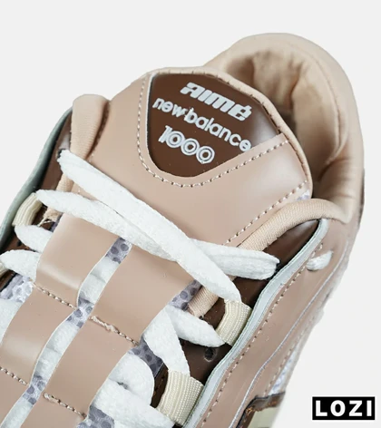 کفش کتانی مردانه و زنانه گلبهی سفید New Balance 1000 مدل 7559