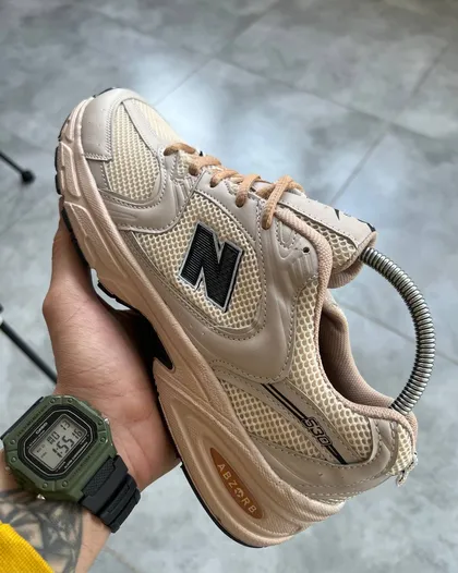 کتانی نیوبالانس رنگ کرم 530 NB