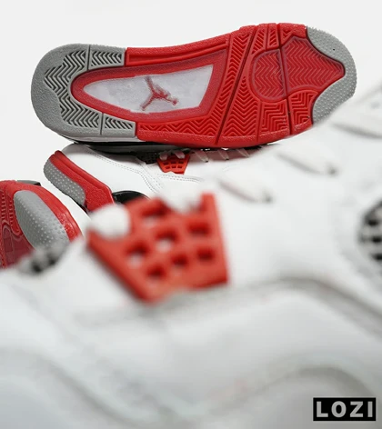 کتانی ساق‌دار بزرگ پا سفید قرمز Nike air jordan 4