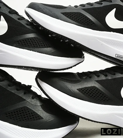 کفش کتانی بزرگ پا مشکی سفید Nike guide 10