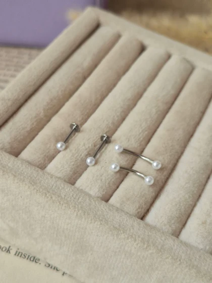 پیرسینگ گوش و ابرو مرواریدی