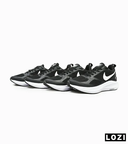 کفش کتانی بزرگ پا مشکی سفید Nike guide 10