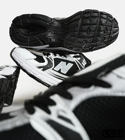 کفش کتانی مردانه و زنانه مشکی سفید NEW BALANCE 530