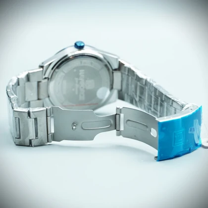 ساعت نیوی فورس بند نقره‌ای قاب و صفحه نقره‌ای سورمه‌ای مدل لژاند علیدسا