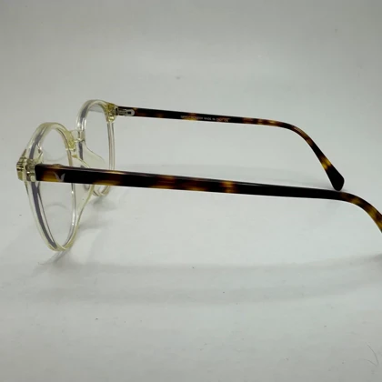 فریم عینک بلوکات طبی نشکن فوق سبک جنتل مانستر 72046 فریم نباتی دسته هاوانا دسته سیم به همراه کاور پارچه ای و دستمال