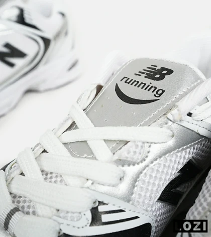 کفش کتانی مردانه و زنانه سفید مشکی NEW BALANCE 530