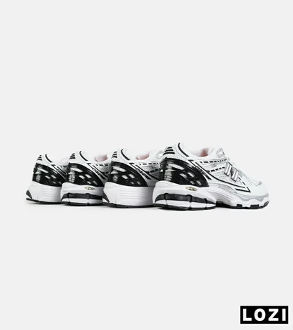 کفش کتانی سفید مشکی New Balance 1906R
