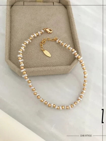 پابند گوی و مروارید