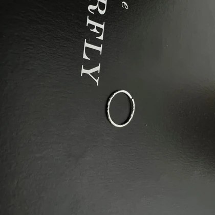 پیرسینگ بینی نقره‌ای حلقه طرح دار