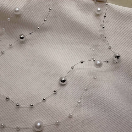 گردنبند نامرئی طرح «مروارید معلق» (Illusion Necklace) | مینیمال و اقتصادی