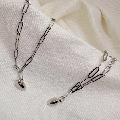 ست دستبند دو نفره مدل «قلب مگنتی» | زنجیر استیل کارتیر ظریف با پلاک مکمل