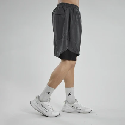 شلوارک کشاله دار ورزشی مردانه آندر آرمور مدل 4H0218 طوسی