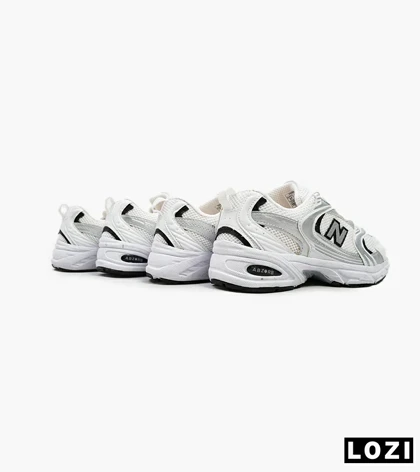 کفش کتانی مردانه و زنانه سفید طوسی NEW BALANCE 530