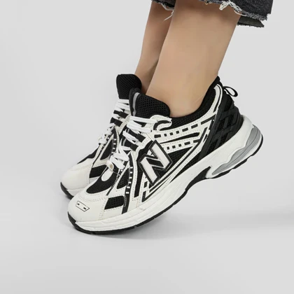 کفش و کتانی زنانه مدل نیوبالانس NEWBALANCE رنگ سفید مشکی کد M1715