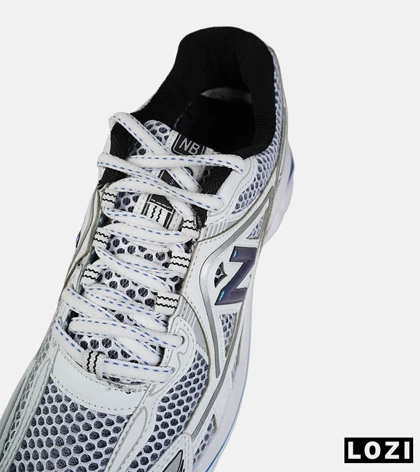 کفش کتانی مردانه و زنانه سفید مشکی آبی NEW BALANCE 1064 V.2 مدل 8990