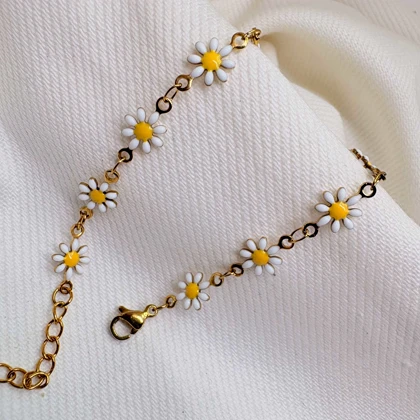 دستبند گل بابونه استیل طلایی