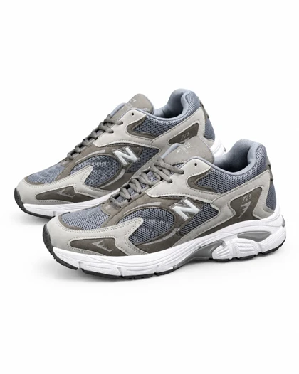 کفش کتانی وبزرگ پا مدل نیوبالانس 725 طوسی سفید New Balance