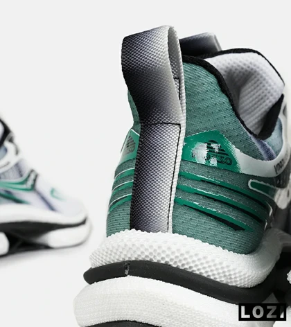 کفش کتانی سفید مشکی سبز Saucony Axon 3