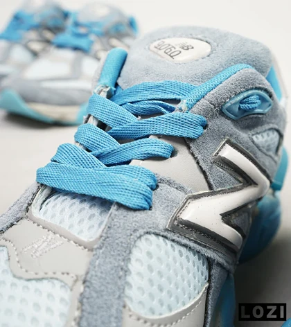 کفش کتانی مردانه طوسی آبی NEW BALANCE 9060