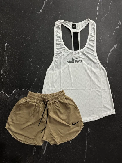 پکیج کد S1112 شامل رکابی پشت کش + شلوارک با تم سفید کرمی