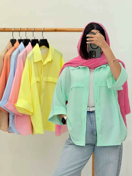 مانتو برش‌دار سر آستین دکمه