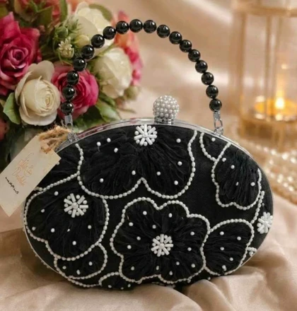 کیف مجلسی زنانه مدل روشان مشکی سفید نقره ای