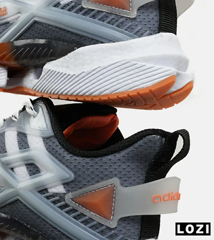 کفش کتانی مردانه و زنانه سفید فیلی نارنجی Adidas SUPERNOVA 3