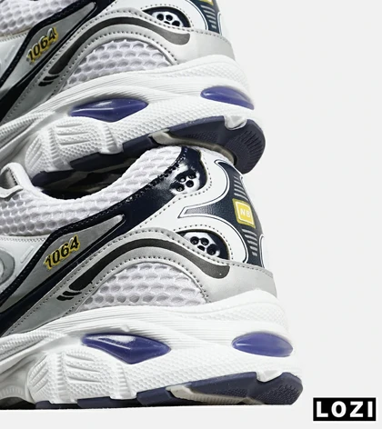 کفش کتانی مردانه و زنانه سفید سرمه ای NEW BALANCE 1064 V.2