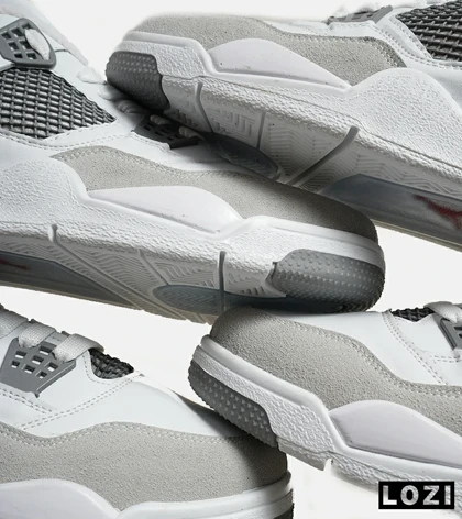 کتانی ساق‌دار بزرگ پا سفید طوسی Nike air jordan 4