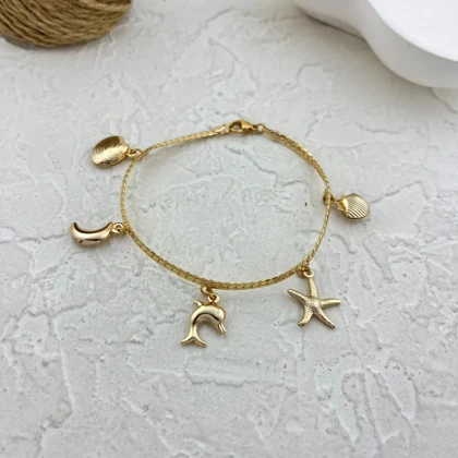 دستبند زنانه ژوپینگ طرح کارتیه با آویز دریایی و صدف