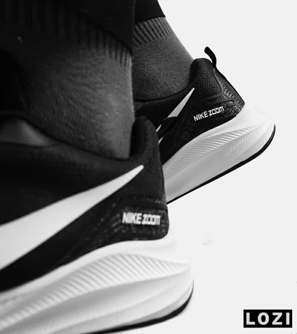 کفش کتانی مردانه و زنانه مشکی سفید Nike air zoom مدل 4546