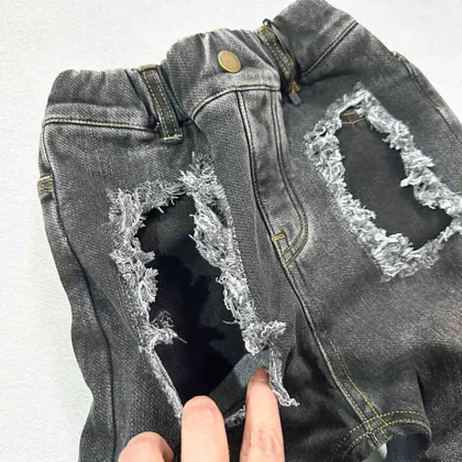 شلوار جین بچه گانه کمرکش زغالی زاپ‌دار