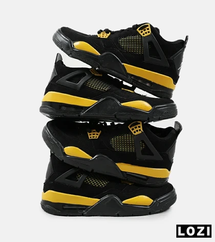 کفش کتانی ساق‌دار مردانه مشکی زرد Nike air jordan 4
