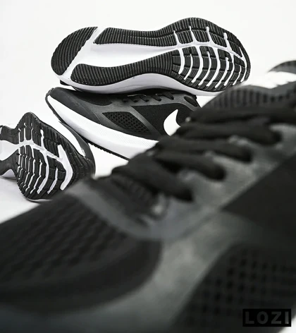 کفش کتانی بزرگ پا مشکی سفید Nike guide 10