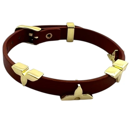 دستبند زنانه چرمی با تزیینات طرح طلا