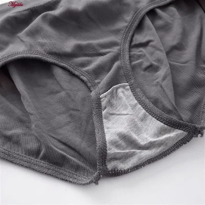 ست نیم‌تنه و شورت ورزشی زنانه خاکستری تیره مدل 4620