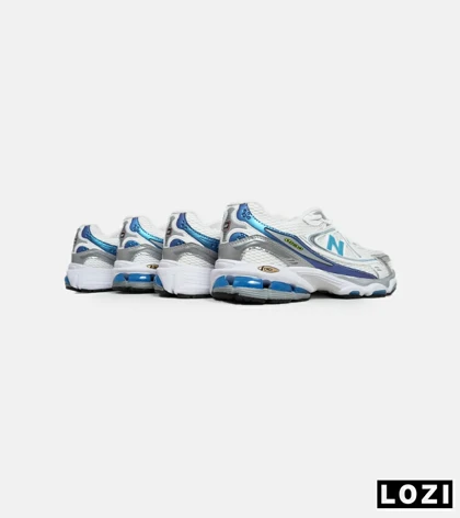 کفش کتانی مردانه و زنانه سفید طوسی آبی NEW BALANCE 1064 مدل 6312