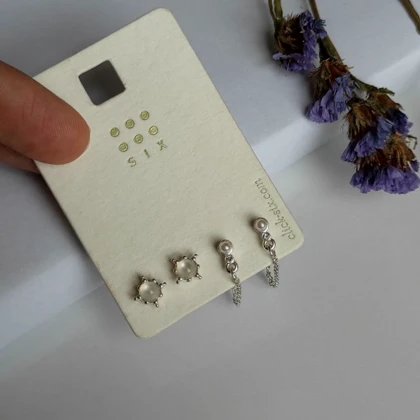 پک 2 جفتی گوشواره زنانه (زنجیر آویز، ستاره نگین‌دار) – آبکاری نقره