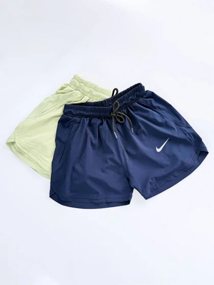 شورتک ورزشی بغل هلال جیب‌دار نایکی Nike
