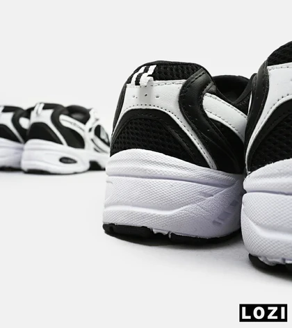 کفش کتانی مردانه و زنانه سفید مشکی NEW BALANCE 530 مدل 3144