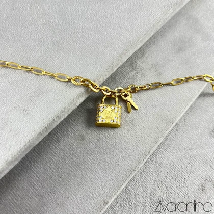 دستبند زنانه طرح لویی ویتون با آویز قفل 40184