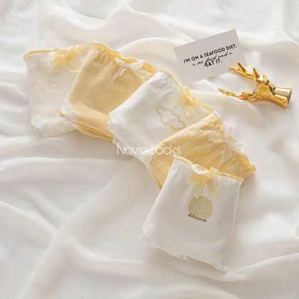 شورت زنانه سفید_لیمویی