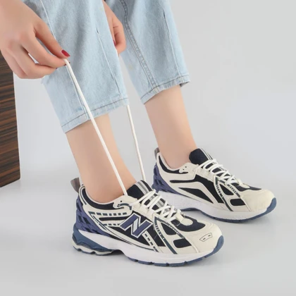 کفش و کتانی اسپرت زنانه و دخترانه مدل نیوبالانس NEW BALANCE رنگ سرمه ای کرم