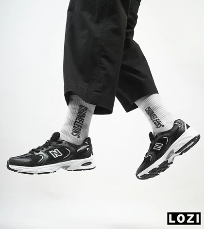کفش کتانی بزرگ پا مشکی سفید NEW BALANCE 530