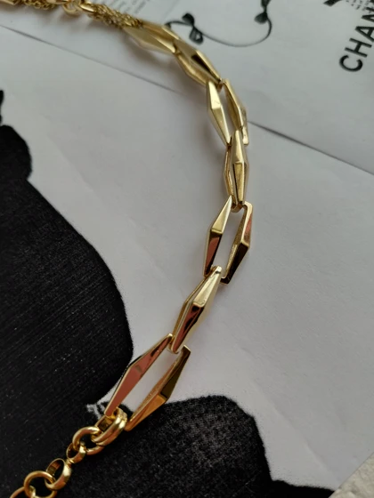 دستبند لوکس زنجیری برند ژوپینگ آبکاری 14k دارای ایراد جزئی
