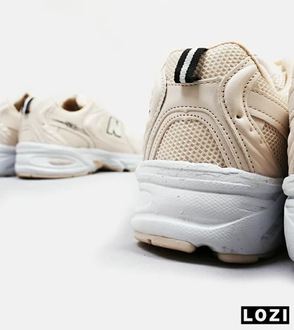 کفش کتانی مردانه و زنانه کرم NEW BALANCE 530